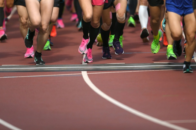 International runners take their starting positions at the stadium